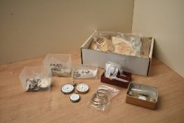 A selection of vintage watch parts including Apex & Tissot acrylic 'crystal' watch glasses,