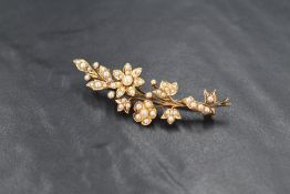 A yellow metal split seed pearl brooch of floral form, no marks but tests as 15ct gold, approx 6g