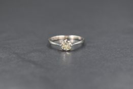 A diamond solitaire ring having an old cut diamond approx 0.4ct in a claw set mount to knife blade