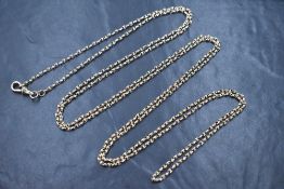 A yellow metal fancy link muff chain, marked 9c, approximately 68' & 27.9g, tests as 9ct god
