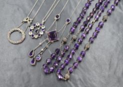 Five vintage white metal necklaces including a marcasite and enamel wreath style necklace, a similar