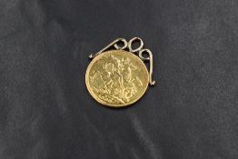 A Victorian sovereign pendant dated 1899 having a yellow metal permanent loop detail,