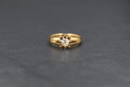 An 18ct gold gypsy ring, having an old cut diamond measuring approximately 0.25ct with raised