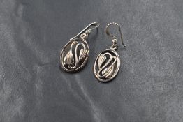 A pair of Charles Rennie Mackintosh silver drop earrings, the pierced oval floral motif earrings