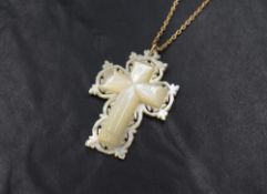 A decorative mother-of-pearl cross pendant, having a pierced border and 'Bethlehem' inscribed to the