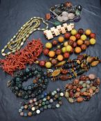 A branch coral necklace and a small selection of polished stone necklaces etc