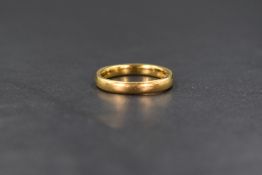 A 22ct gold band, of rounded form, marked 22 with hallmarks, ring size O-P, 6g