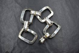 A Danish silver plated pewter four link chunky style bracelet by Erik Dennung of Denmark having a