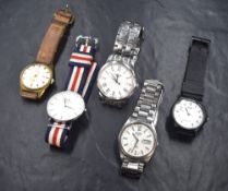 Five gent's wrist watches including Tissot 1853, Daniel Wellington 3ATM, ZEIH Calendar, Seiko 7546 &