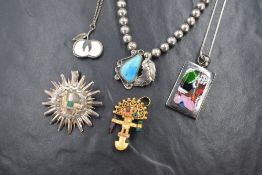 Five pieces of white metal jewellery, most stamped 925/silver, including a Peruvian style gold