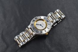 A ladies Must de Cartier 21 quartz wrist watch, model: 1330 having a black Roman numeral outer