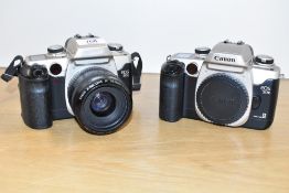 A Canon EOS50E camera with Canon Zoom 1:3,5-4,5 35-70mm lens and another camera body spares and