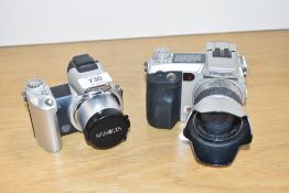 Two Minolta digital cameras
