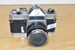 A Chinon CS circa 1978 35mm SLR camera with CdS TTL match needle metering, with Reflecta 1:1,7