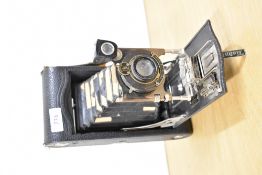 A Kodak folding Autographic Brownie 3A Model C camera with Anastigmat f:77 170mm lens
