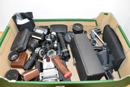 A box of various flashes, light meters, extention tubes, filters etc