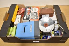 A box of various photographic equipment including Slide Viewer, Film Splicer, Filters, flash bulbs
