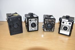 Four Box Cameras. A Rex Coronet, a Kodak Six-20 Brownie, an Ensign 21/4B and a Conway Camera