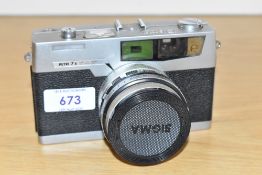 A Petri 7s camera circa 1962 with circle - eye system having Petri 1:2,8 45mm lens