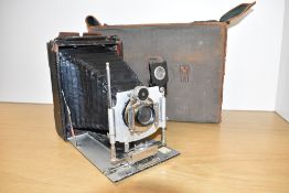 A Cameo 5 pressman camera in original case with wooden and metal plate holders