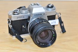 A Yashica FRII camera circa 1978 with Super Paragon PMC Auto Zoom 1:3,5-4,5 28-50mm lens