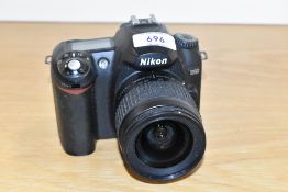 A Nikon D50 digital camera with Nikkor AF 1.3,3-5,6 28-80mm lens