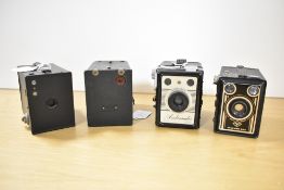 Four Box cameras. A Coronet Ambassador, an Agfa Syncro Box 600, and two Kodak Brownie No2