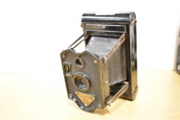 A Rajar No6 folding camera in bakelite