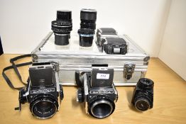 Two Bronica cameras. A Bronica C and a Bronica S2 with a Nippon RP 1:2,8 75mm lens, a Nikkor-H 1:3,5