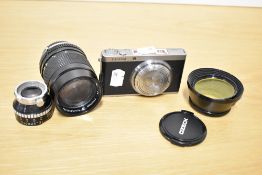 A Fujifilm digital camera with an Ozeck II Auto MC 1:2,8 135mm lens and Hammar telephoto lens