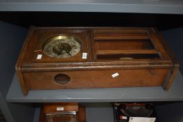 A oak cased 8 - day wall clock, L62cm