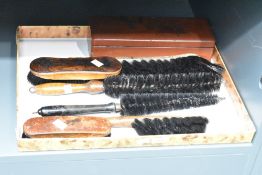 A group of gentleman's clothes grooming brushes, largest L37cm, sold together with a Chinese