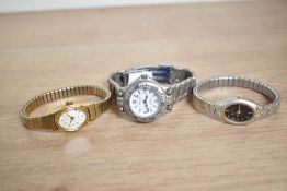Three ladies watches, to include a Timex Quartz, a Constant Quartz and a Sekonda.