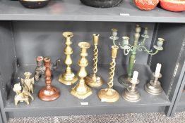 A pair of early 20th century brass barley twist candlestick, h29cm, sold together with another