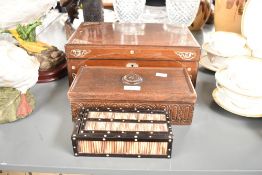 A 19th century rosewood writing slope, decorated with mother of pearl inlay, having fitted