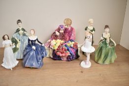 A group of seven Royal Doulton bone china figurines comprising 'Fluer' HN 2368, 'Sentiment's