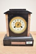 A late 19th century French slate 8 - day mantel clock having enable dial and Roman numerals, h23cm