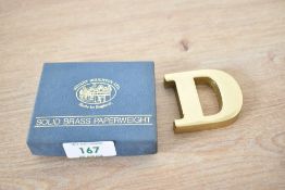 A solid brass letter 'D' paperweight with box, h5.2cm