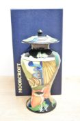 A Moorcroft pottery 'Ryden Field's pattern vase of baluster form with cover, impressed marks to