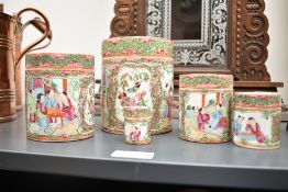A group of 5 Chinese Canton Famille Rose porcelain jars with covers, hand painted with floral