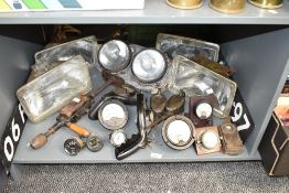 A pair of high rate discharge testers, sold together with a pair of oil cans, head lamps, number