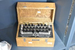 An early 20th century Griffin & George Limited resistence box, impressed patent No.P3888, L29cm