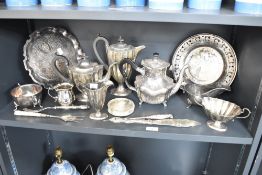 A silver plated tea service, to include tea pot, coffee pot, scalloped edged plate, gravy jug