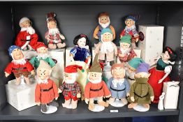 A group of Snow White and the seven Dwarf figures retailed by The Ashton-Drake Galleries, to include