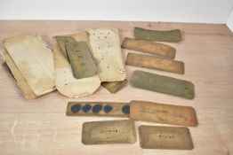 A group of early 20th century sheet metal alphabet stencils