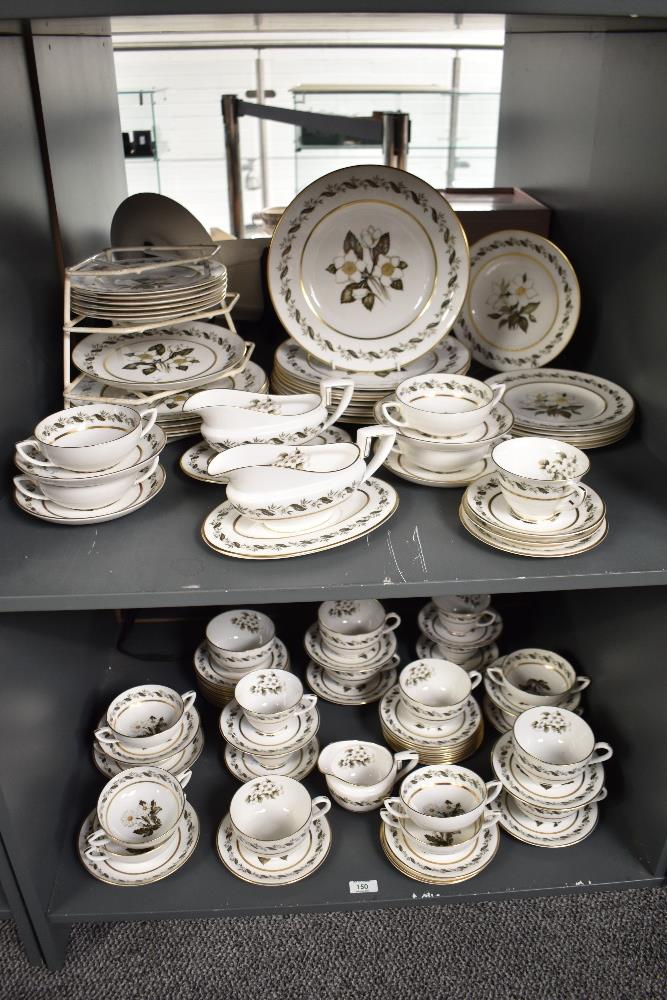 A Royal Worcester Bernina pattern fine bone china dinner service, decorated with gold colour