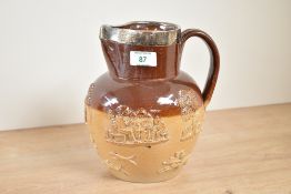 A Victorian stone ware hunting jug in the style of Royal Doulton Lambert pottery, having silver