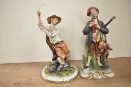 Two large Capodimonte figures depicting a fisherman and hunter, both stamped on the backside