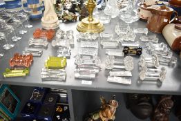 A large collection of cut crystal knife rests, largest 11cm, ( 62 )