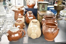 A cream colour stoneware hot water bottle, L24cm, sold together with 2 other stoneware bottles, 2